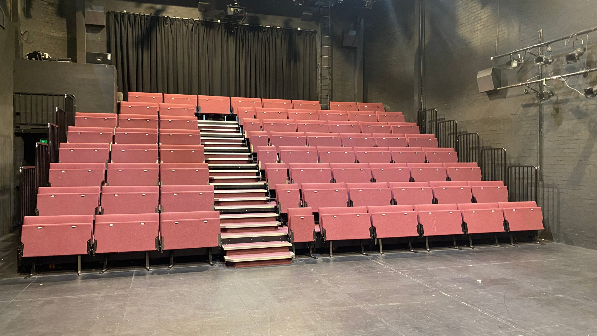 A bright photograph of the seating bank in The Door.