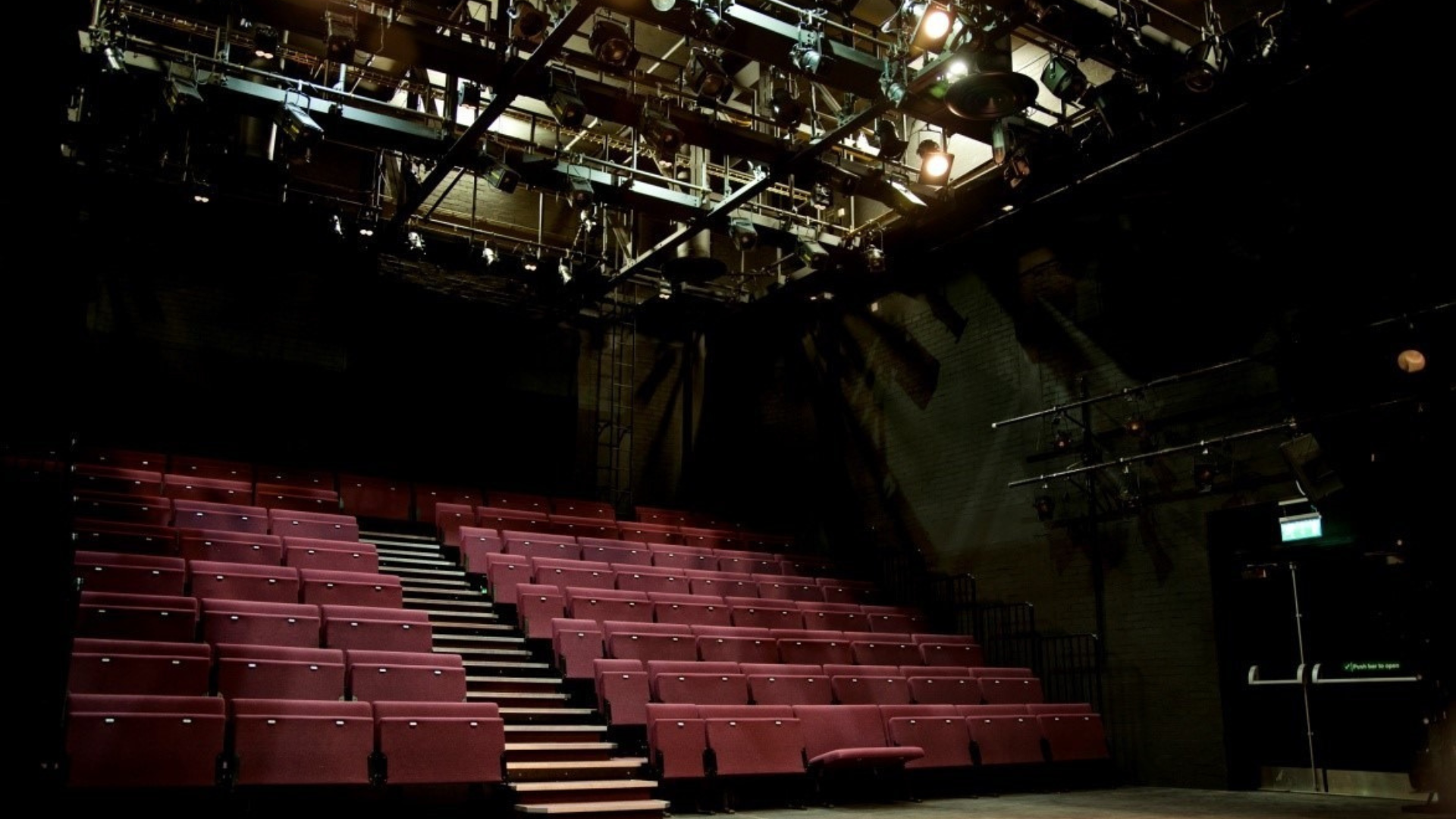 A photograph of the seating bank and stage area in The Door.