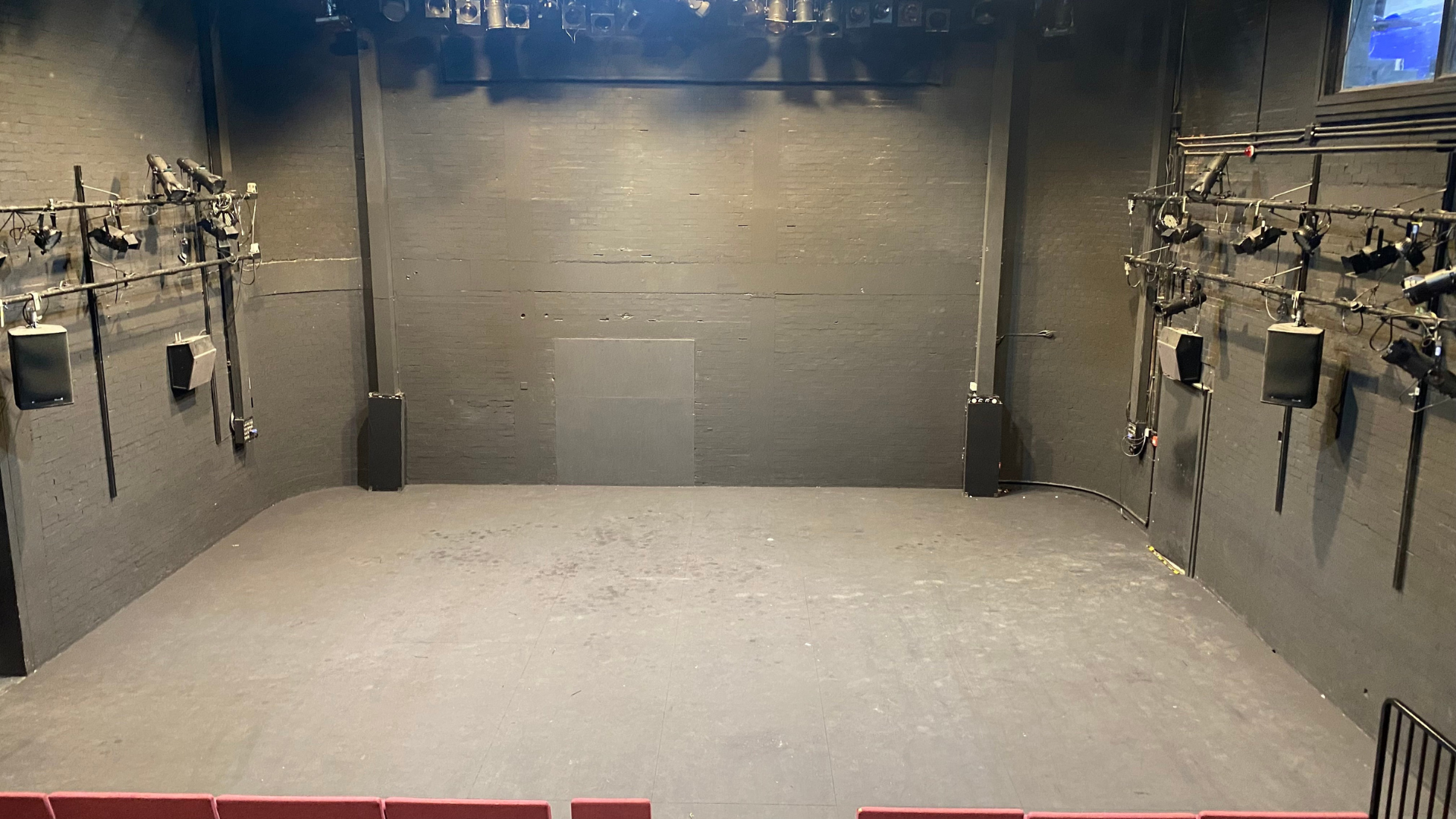 A photograph showing the empty stage of The Door.