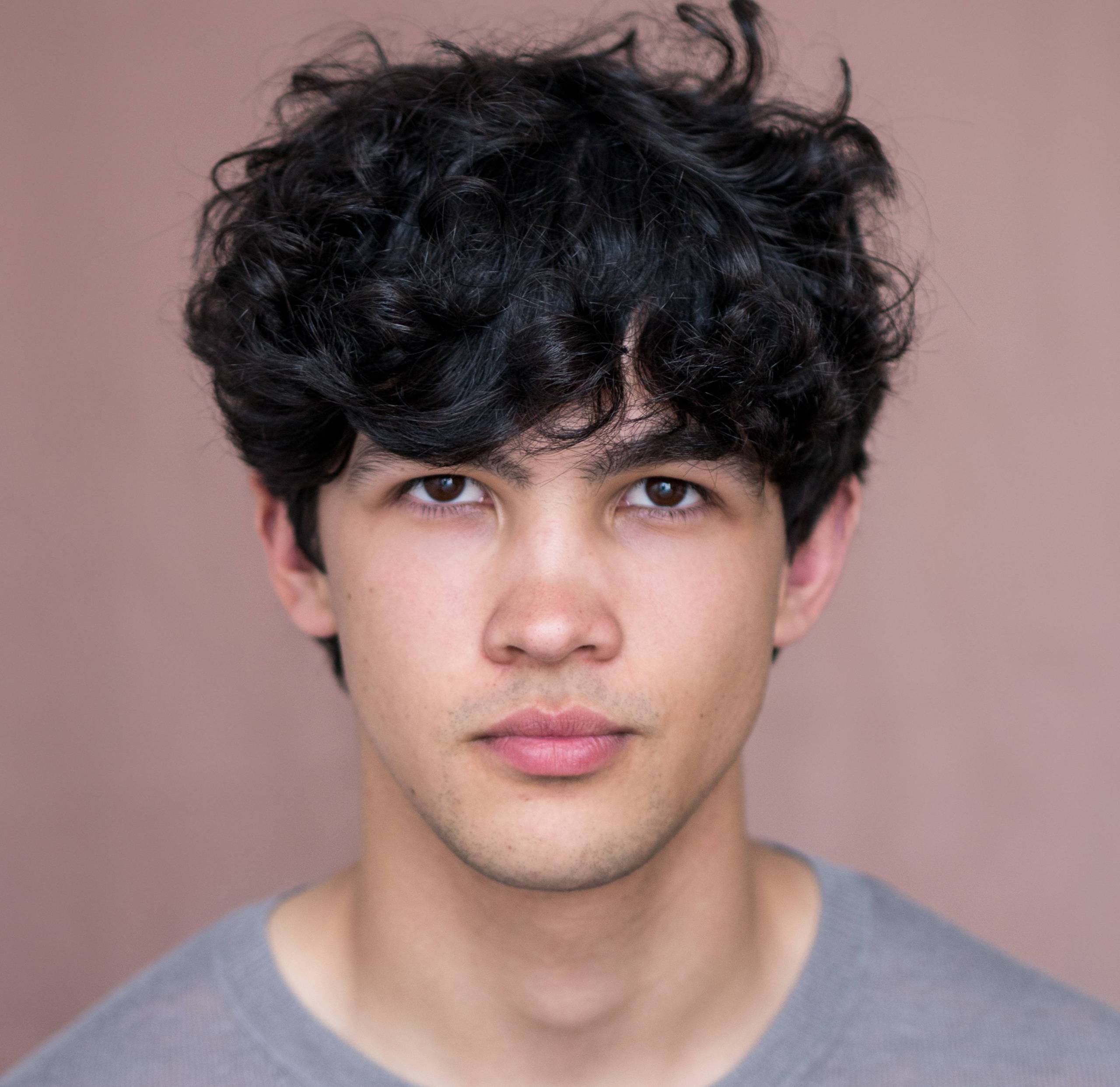 Headshot of Justin Kendal-Sadiq